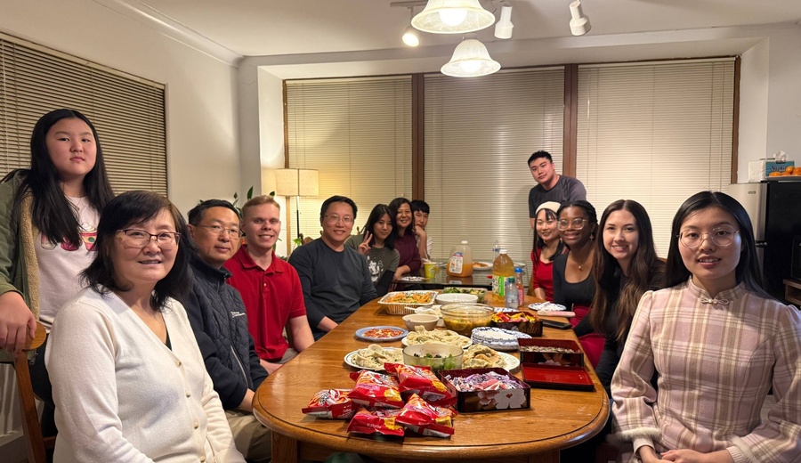 Church fellowship meal around a table